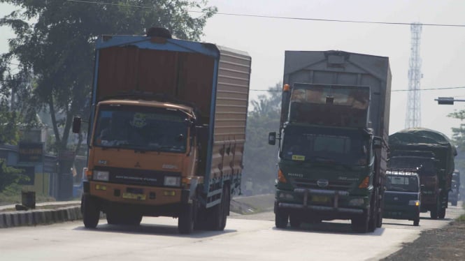 Ilustrasi truk logistik pengiriman barang.